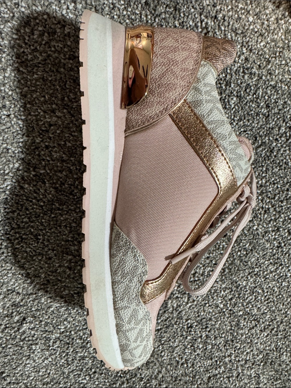 Women’s Pink Michael Kors shoes.